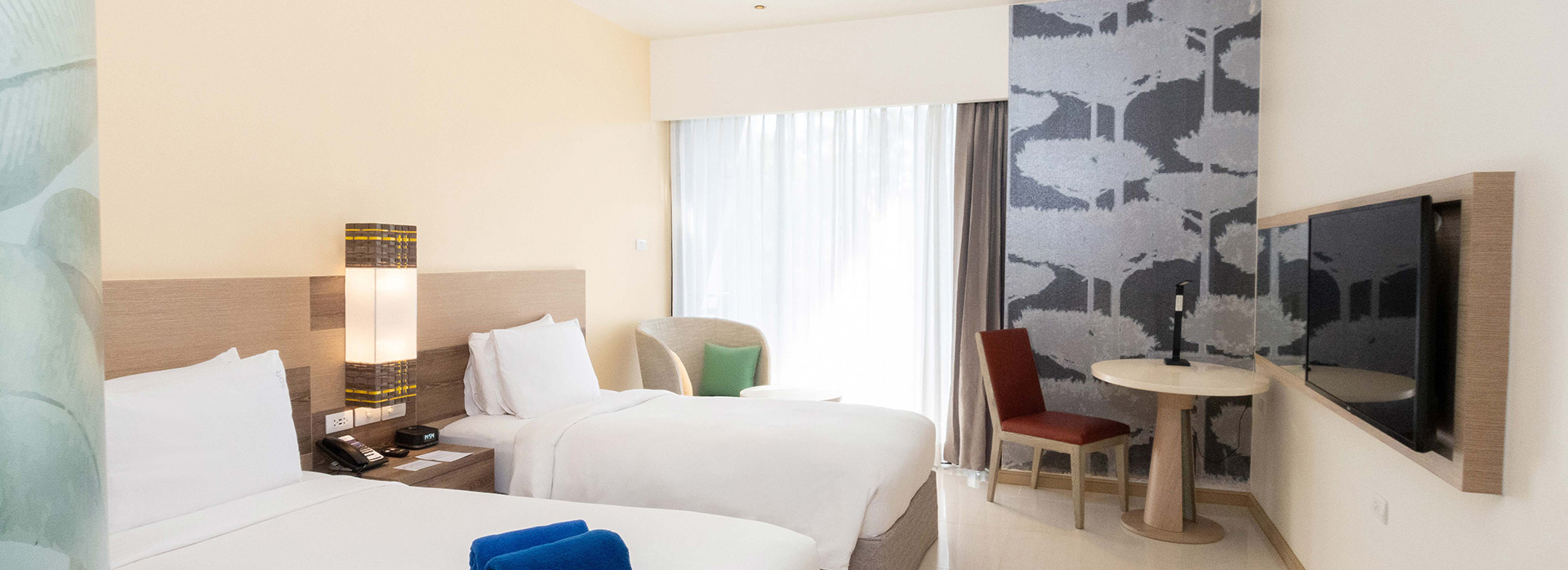 Relax in our spacious room with a stunning garden view.